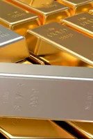 Gold Dips, Silver Rises Amid Tensions