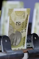 Rupee edges higher against dollar on softer greenback, India-EU trade deal support