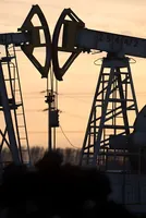 Crude prices rise nearly 2% amid choppy trade