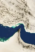 A Dozen Ships Switch Oil Outside Hormuz