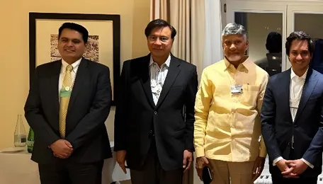 Babu, Lokesh Meet Mittal at Davos