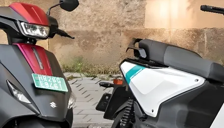 Suzuki e-Access vs Yamaha EC-06 comparison: Night and Day 