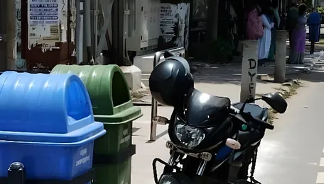 Chennai Bins Obstruct Roads Creating Commuter Risks