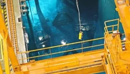 A 2-megawatt reactor humming in China's Gobi Desert runs on liquid salt at 650 degrees instead of water, and last year it pulled off something no reactor had done: it swapped in fresh thorium fuel while still running, like a car refueling at 70 mph 