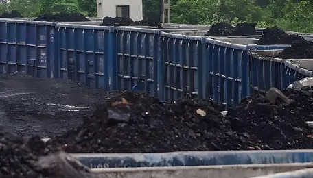 India trims coal production amid power demand falls and stocks swell 