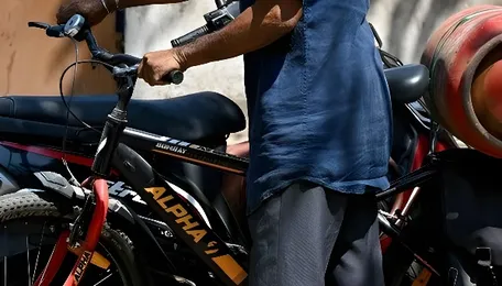 Indians forced ‘back in time’ to cooking with coal as Iran war gas shortages lead to long fuel queues 