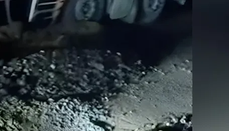 Assam: Loaded truck gets stuck in pothole on NH-27 in Dima Hasao 