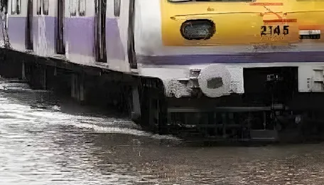 Mumbai Train Delays After Sudden Rainfall Chaos