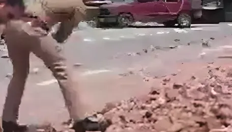 Watch: Truck flees after dumping stones on Noida highway, cops left clearing debris 