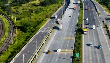 Why Bharat introduced a common design code for its 50,000 km high-speed national highway corridor? 