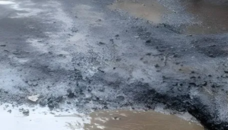 Noida commuters battle monsoon-hit roads and rising pothole dangers daily