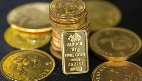 Gold trades in tight range as market focuses on US economic data