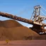 Dalian iron ore little changed, faces steel production curbs in China hub