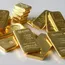 Gold prices dip as firmer dollar dampens appeal