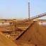 Iron ore consolidates gains, set for 3rd weekly rise on China demand