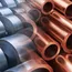 Base metals rise as dollar rally pauses